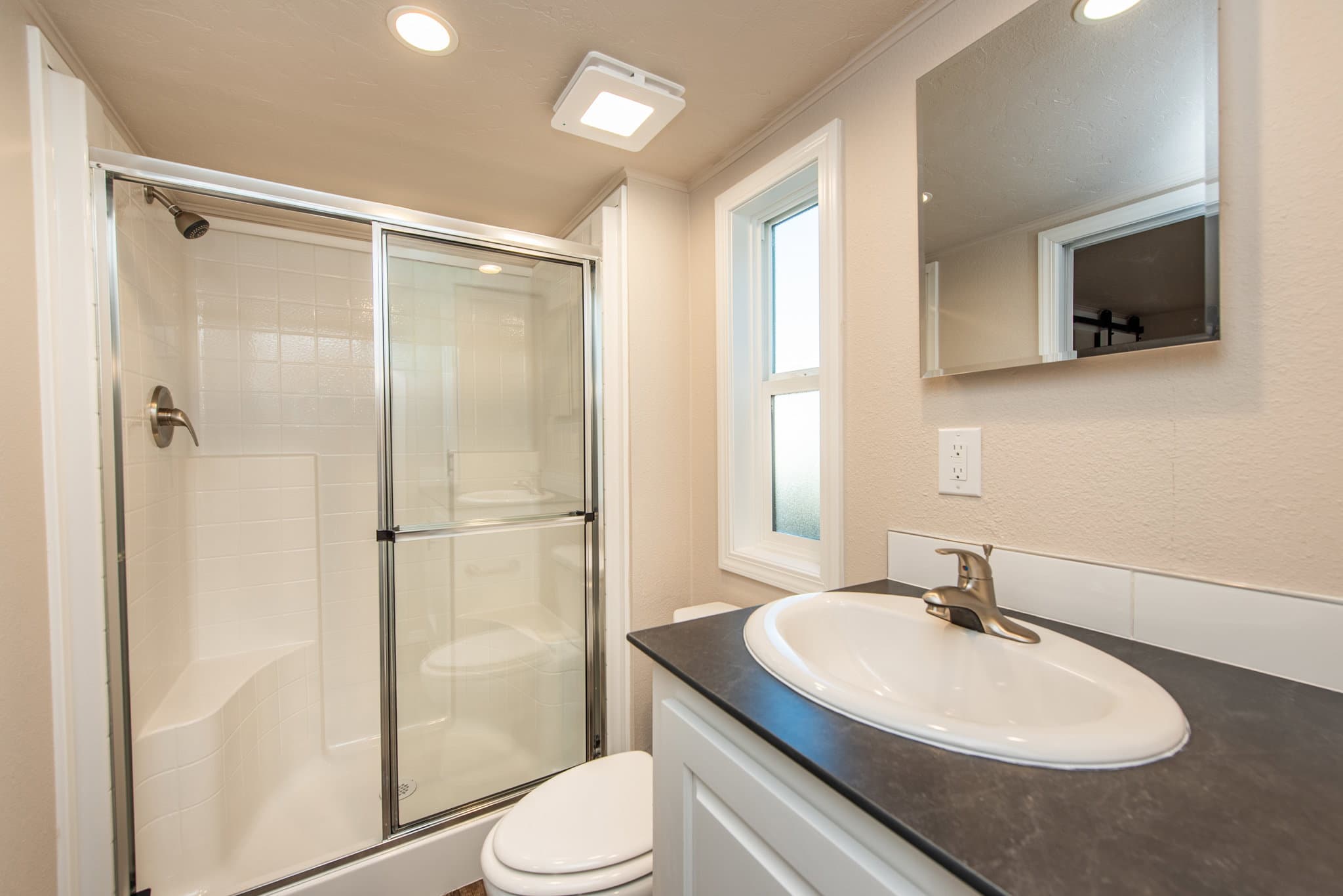 The lofted olympic bathroom home features